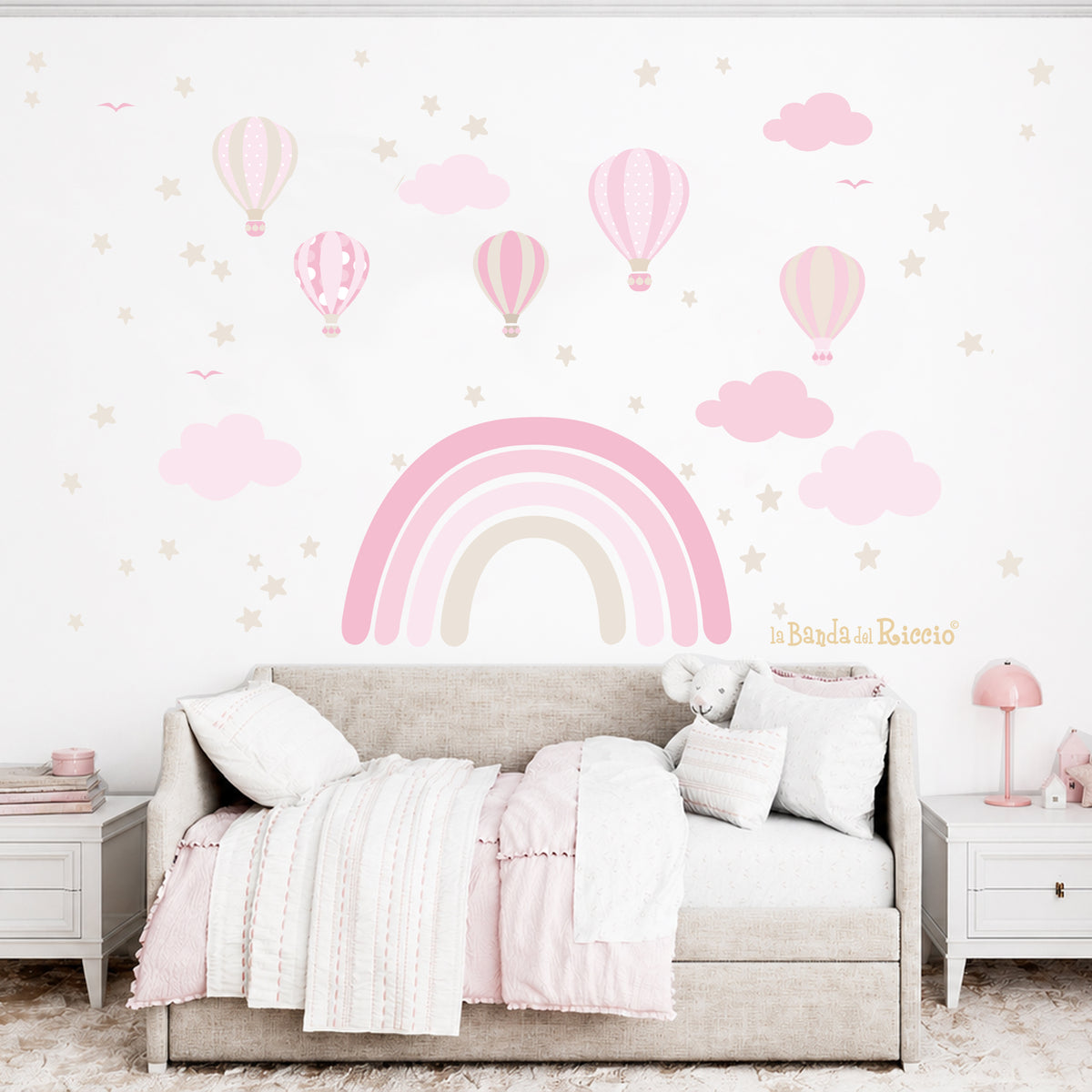 Arcobaleno con stelle toni rosa
